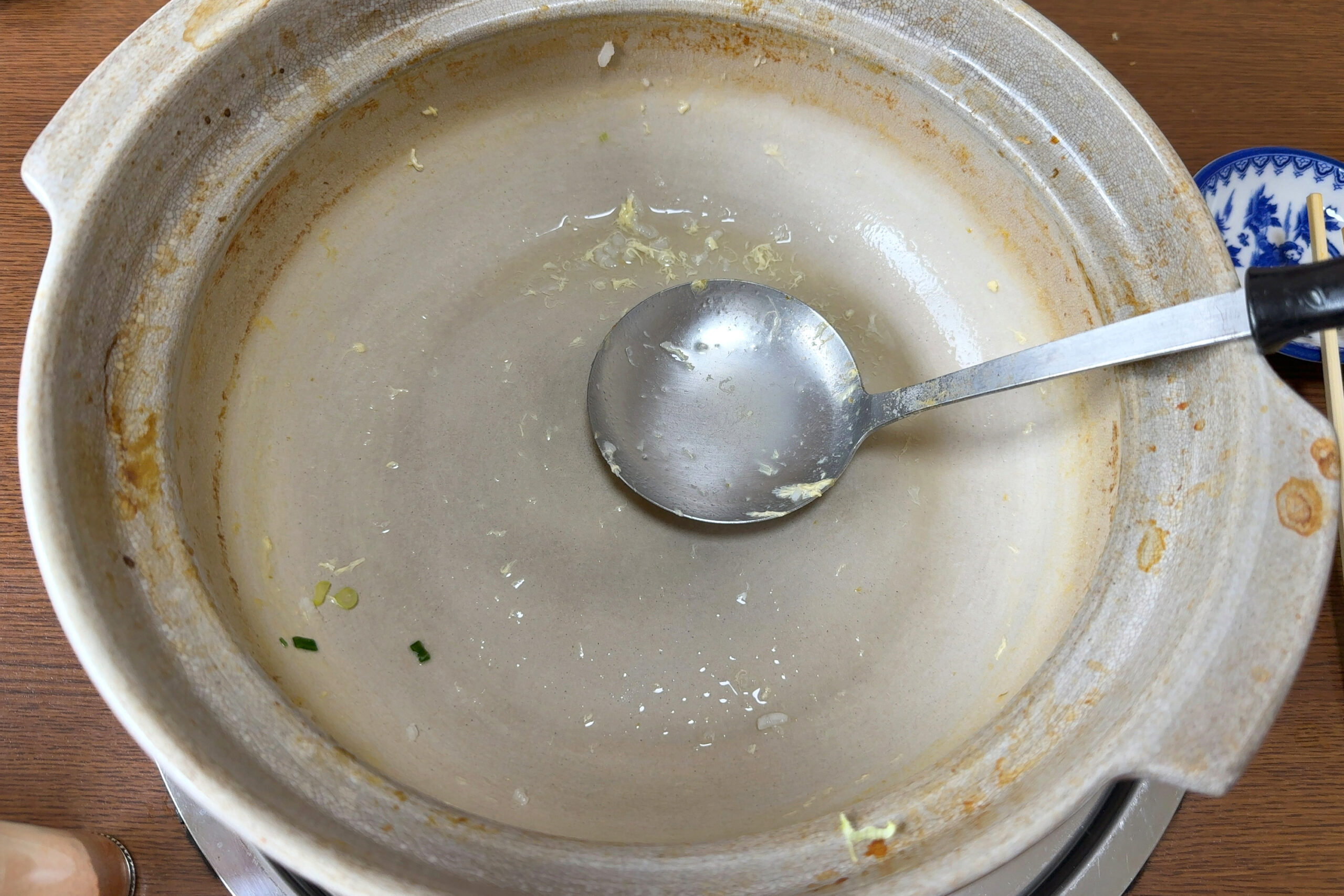 伊勢海老雑炊を最後の一口まで味わった後の器